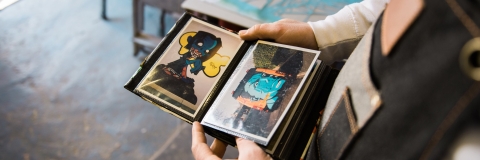 Artist Eric Downer looking at work in his studio