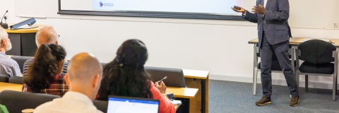 Staff sat listening to a session