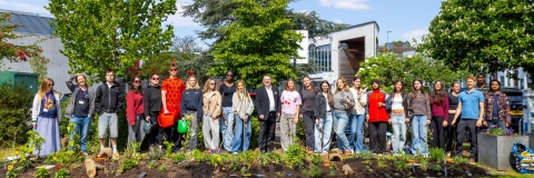 Students planting a wildlife-friendly area on campus