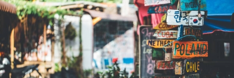 destinations on a street sign in Thailand