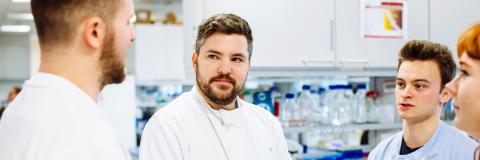 Male University of Portsmouth PhD candidate in the lab