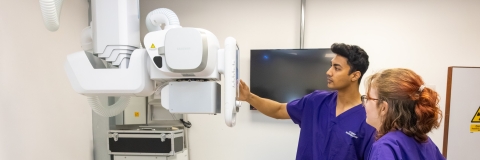 Students with an x-ray machine