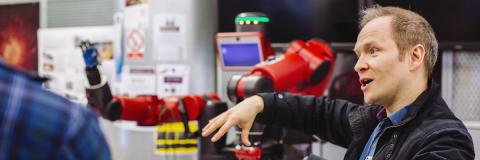 University of Portsmouth lecturer with robot