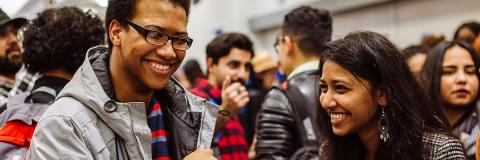 two Bangladesh students laughing at the festival of cultures