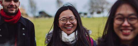 Chinese students smiling on the common