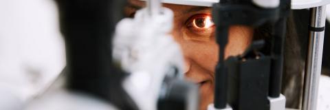 a female student from The Philippines using optometry equipment