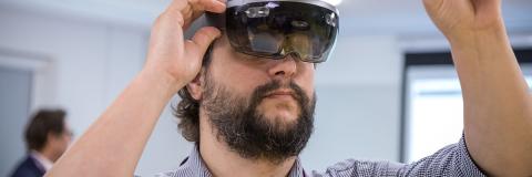 staff member using research equipment