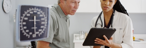 Clinician helping a patient