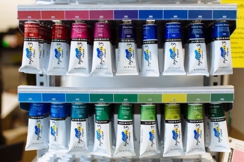 Rows of paint tubes in different colours