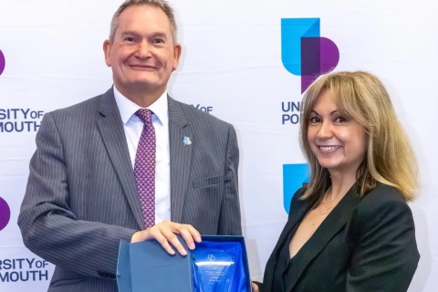 Headshot of Dr Lisa Sugiura smiling