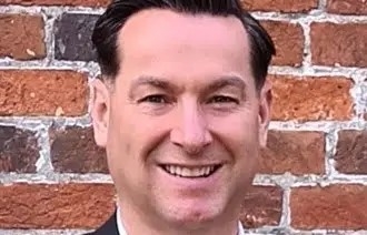 Headshot of Dr Martin Brock smiling