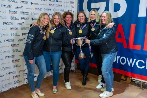 Team Ithaca with their medals and cup 