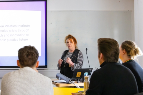 Speaker engaging the audience during an interactive seminar.