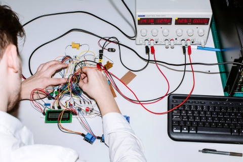 Male student in the telecommunications lab