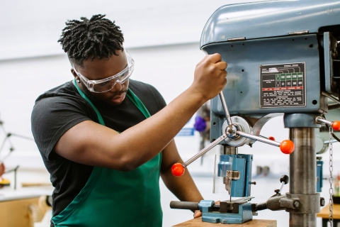 Student using a pillar drill