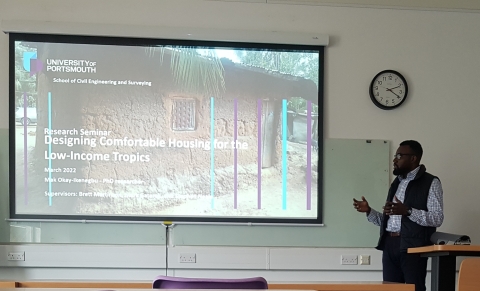 Mak presenting his research at a research seminar