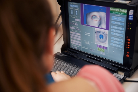 Person using eye tracking software