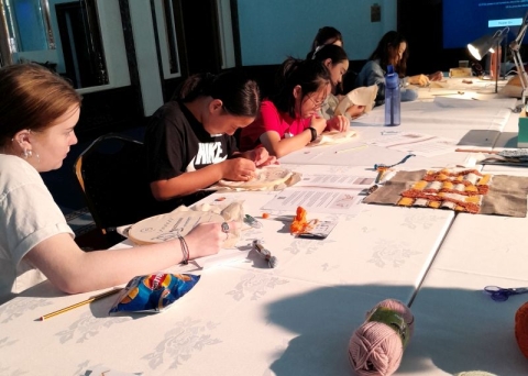 Students at a cushion-making workshop