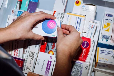 Student using model pharmacy