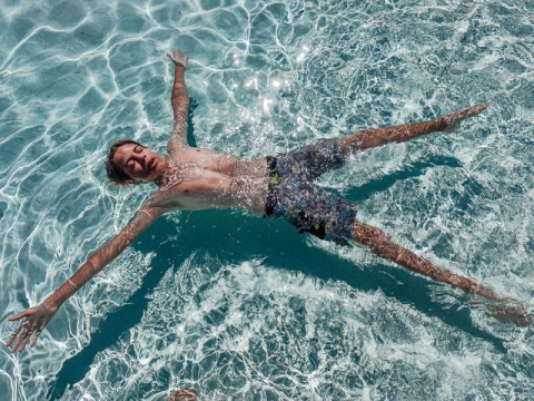 A boy floating in water