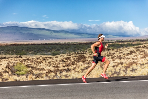Triathlete running uphill