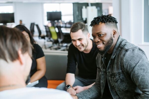 Group of students smile in technology facilities