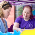 Female Clearing applicant talking to a female Student Ambassador at a Clearing Visit Day