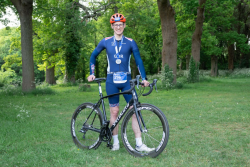 Dr Guy Collender holding his bike