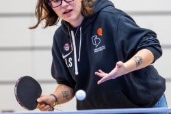 Lucille the blog writer playing table tennis