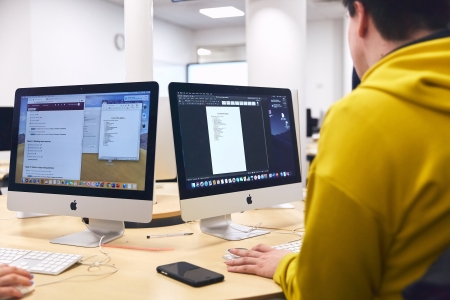 Student behind a computer