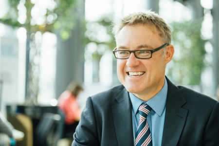 Marc Lintern smiling in bright light