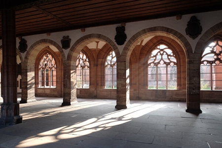 Classic interior architecture with arches, pillars and sunlit windows