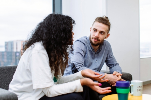 Students talking in accommodation common area